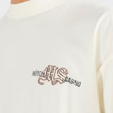 Camiseta Palm Resort Crema | Camisetas Hotel y Casino | Monoic Studios