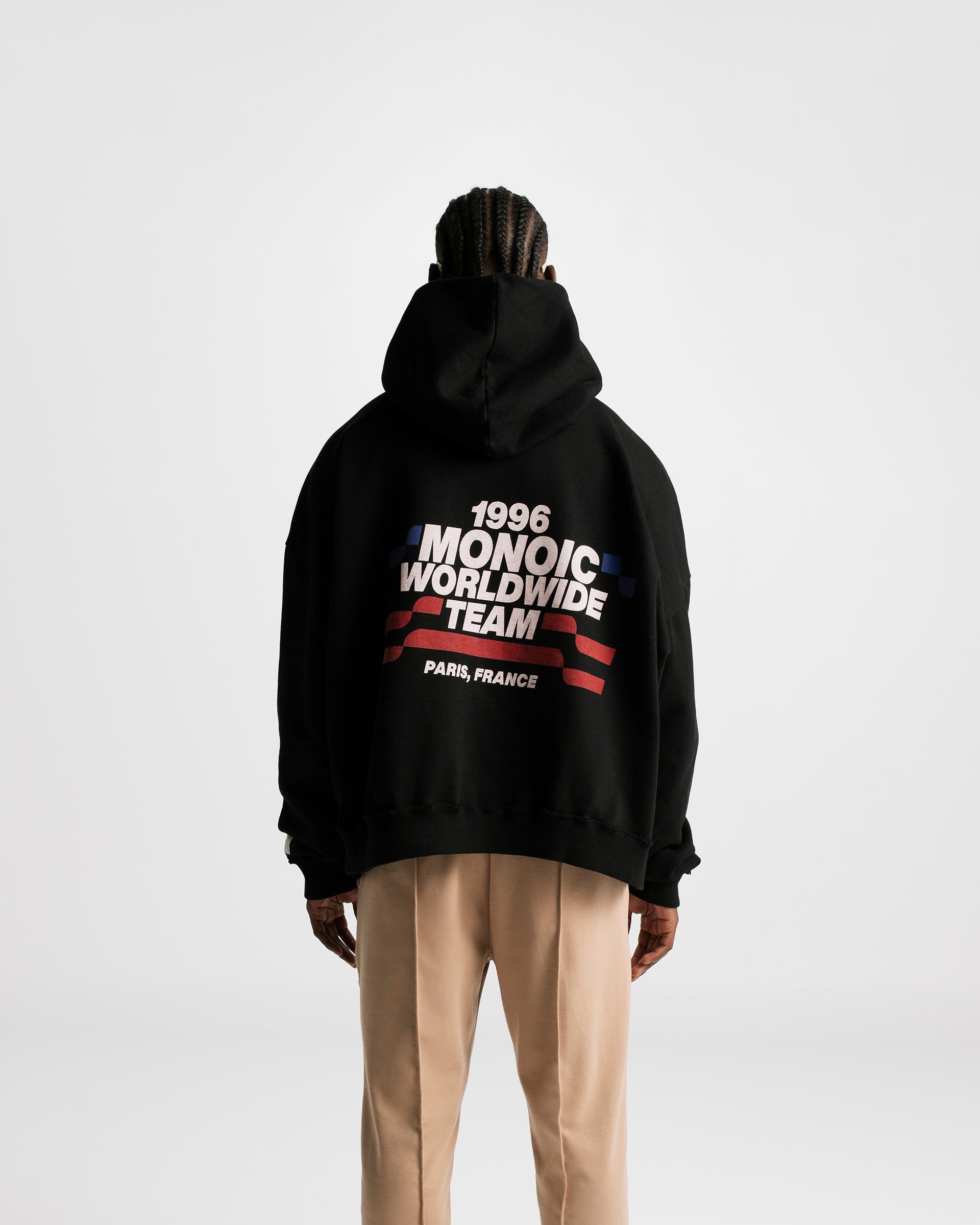 Hoodie Boxy Fit Worldwide Team Negro Oscuro | Hoodies Parisian Dreams | Monoic Studios